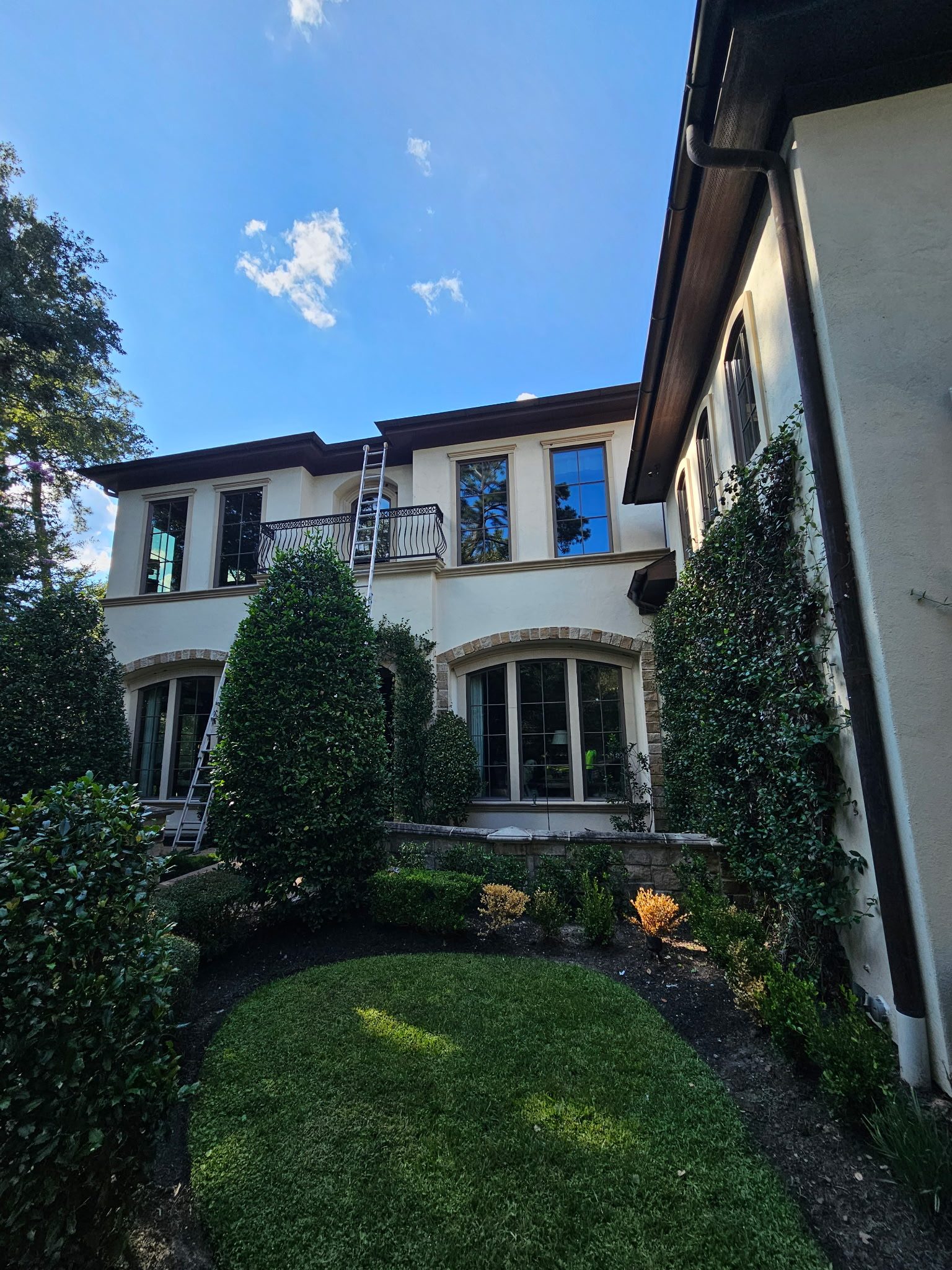Completed exterior repaint with landscaped yard